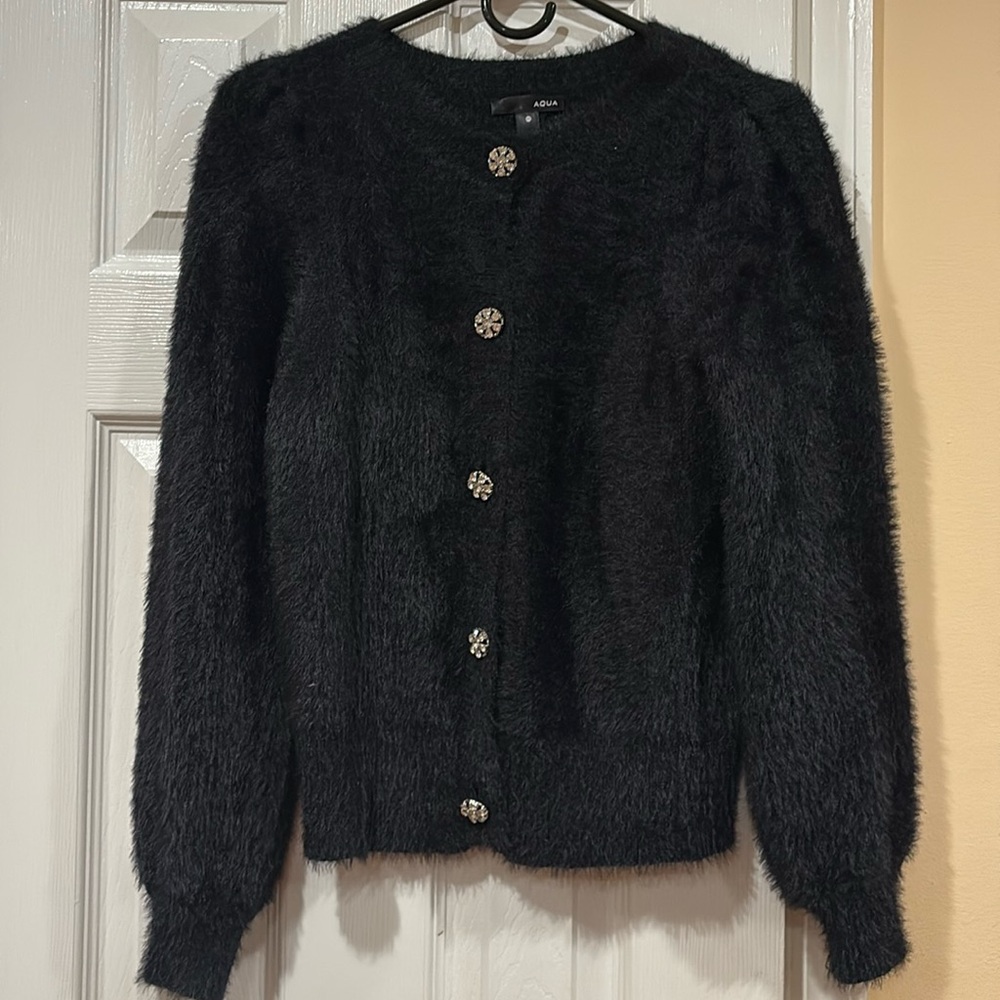 Woman’s black faux fur cardigan
